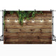 Riyidecor Vintage Wooden Board Backdrop Green Leaves on Brown Wood Plank Floor Plants Lights Rustic Retro Birthday Party Photographic Background 7Wx5H Feet Decor Props Photo Shoot Banner Fabric