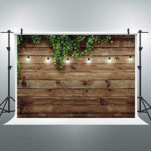 Riyidecor Vintage Wooden Board Backdrop Green Leaves on Brown Wood Plank Floor Plants Lights Rustic Retro Birthday Party Photographic Background 7Wx5H Feet Decor Props Photo Shoot Banner Fabric